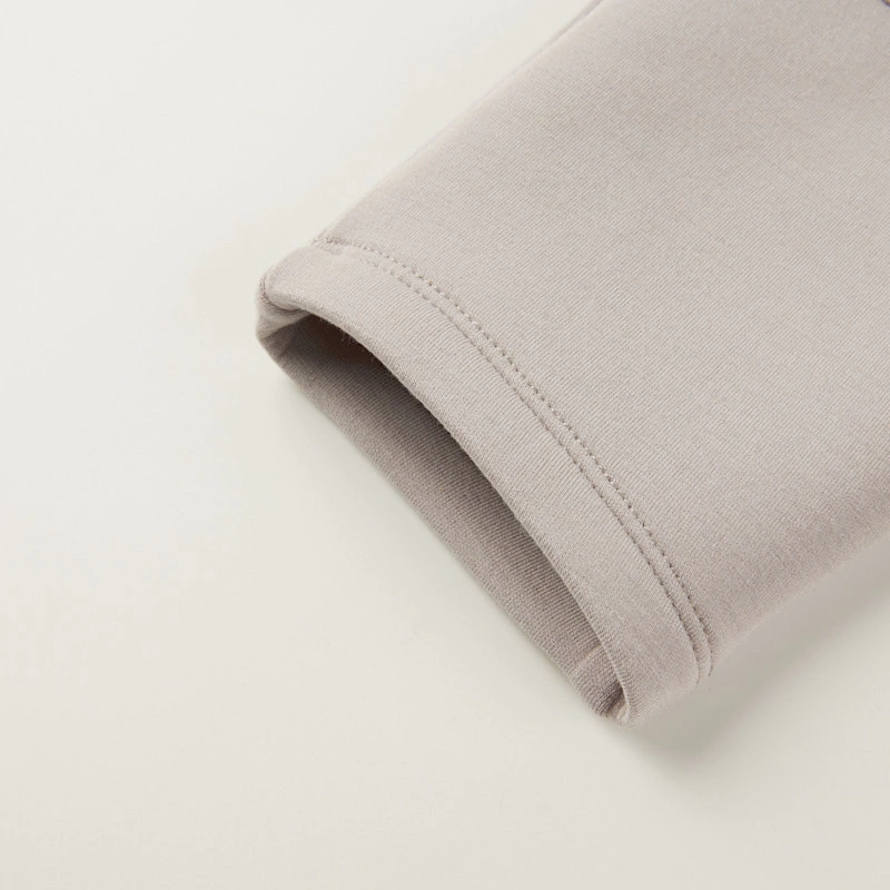 Close-up leg opening of  breathable, soft baby scuba dungarees