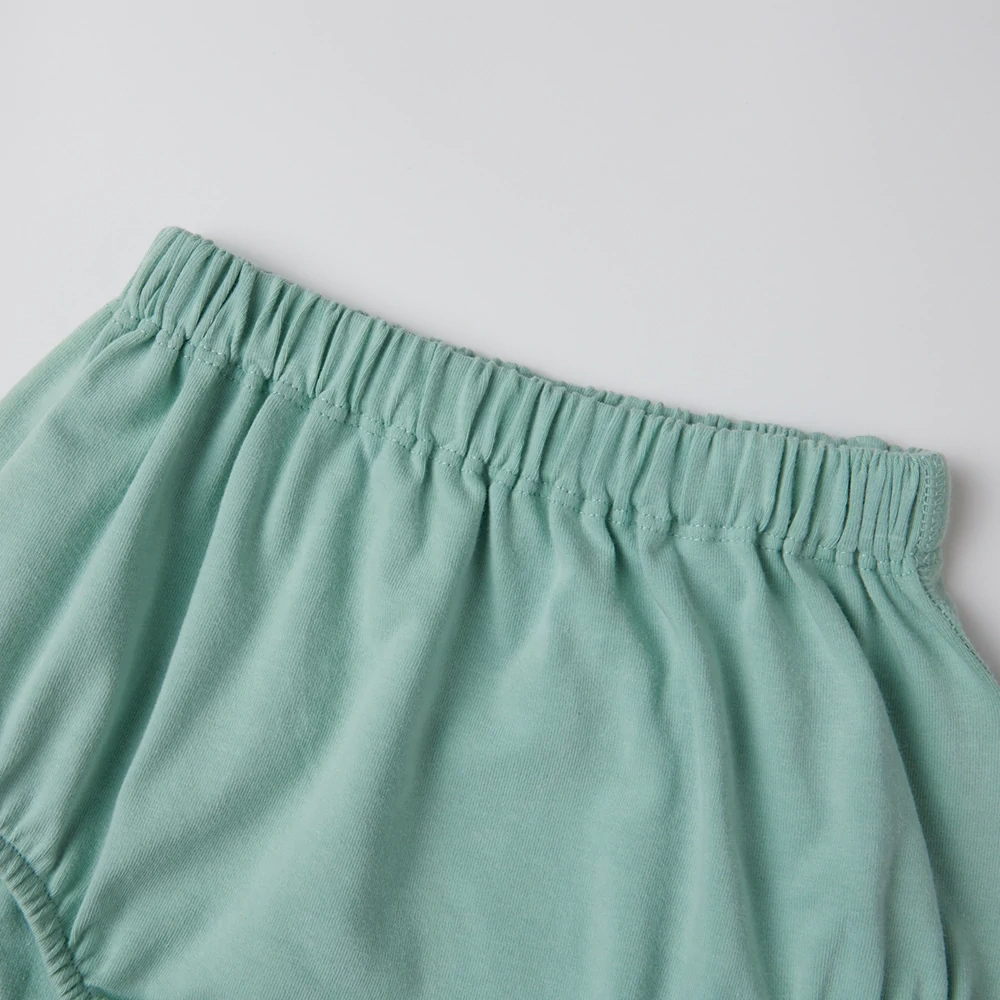 Organic cotton plant-dyed baby bloomer shorts with soft waistband and gathered leg openings