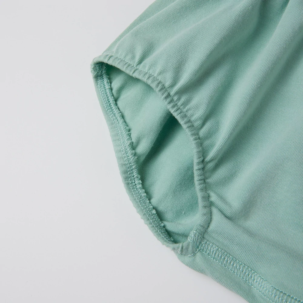 Organic cotton plant-dyed baby bloomer shorts with soft waistband and gathered leg openings