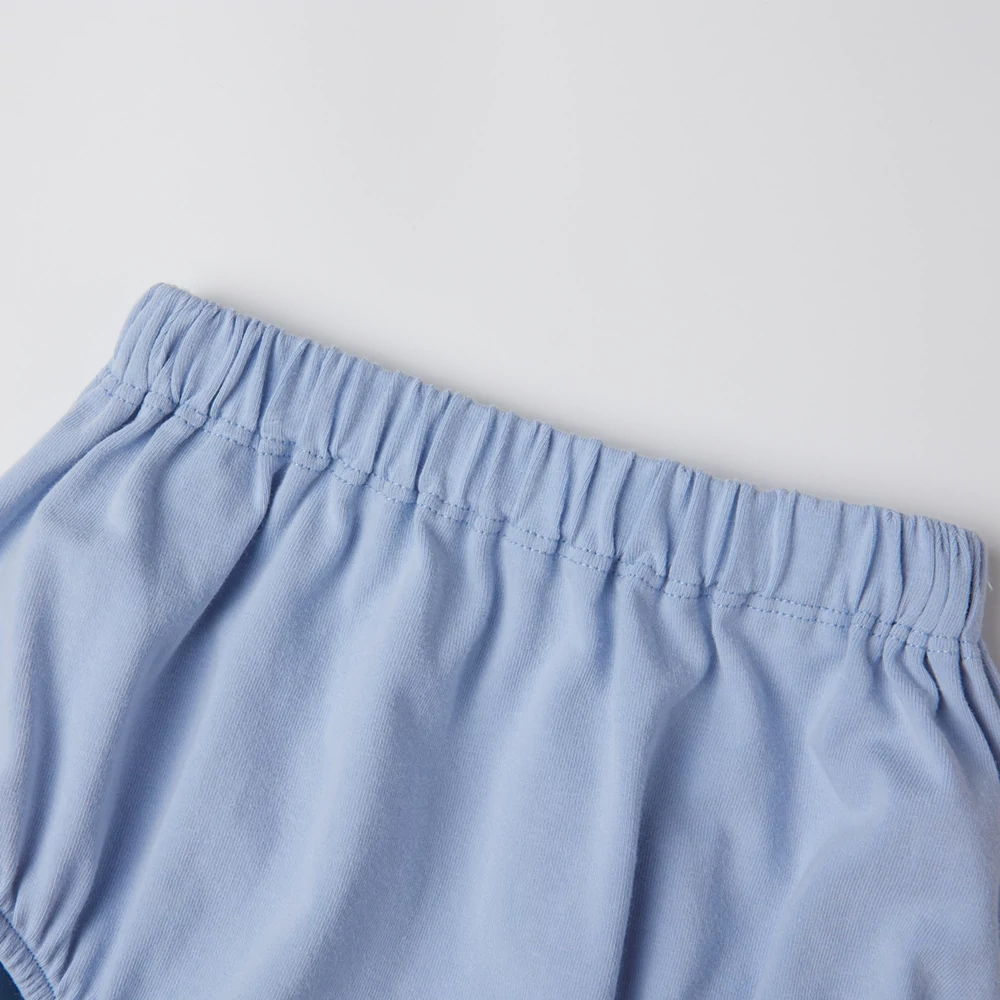 Organic cotton plant-dyed baby bloomer shorts with soft waistband and gathered leg openings