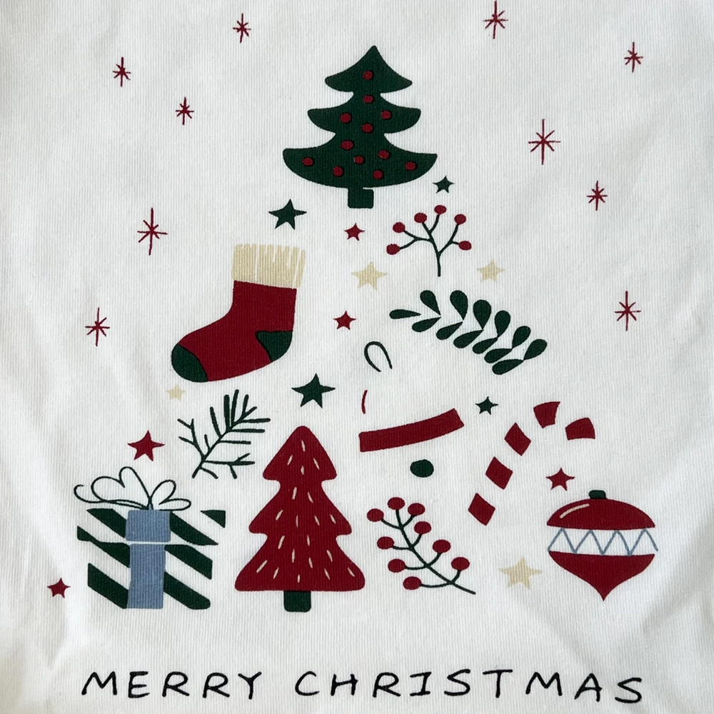 Flat-lay of festive dog baby bodysuit, soft jersey knit