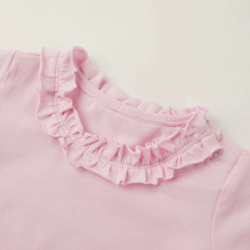 Ruffle neck close-up — naturally dyed color