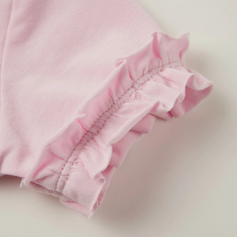 Ruffle sleeve close-up — naturally dyed color