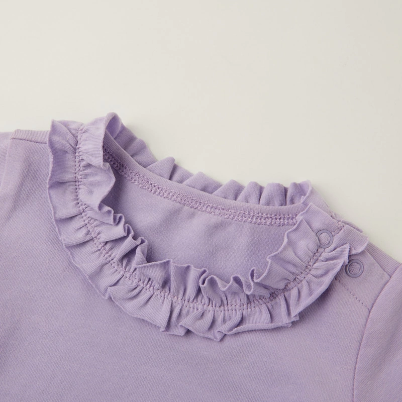 Ruffle neck close-up — naturally dyed color