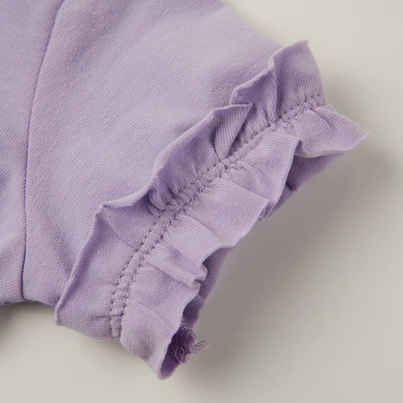 Ruffle sleeve close-up — naturally dyed color