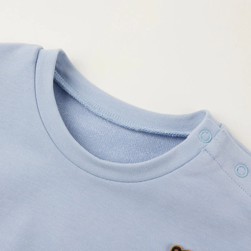 Neckline and shoulder snap detail for sizing article