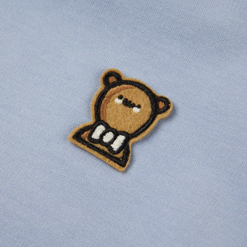 Bear patch on natural baby blue bodysuit