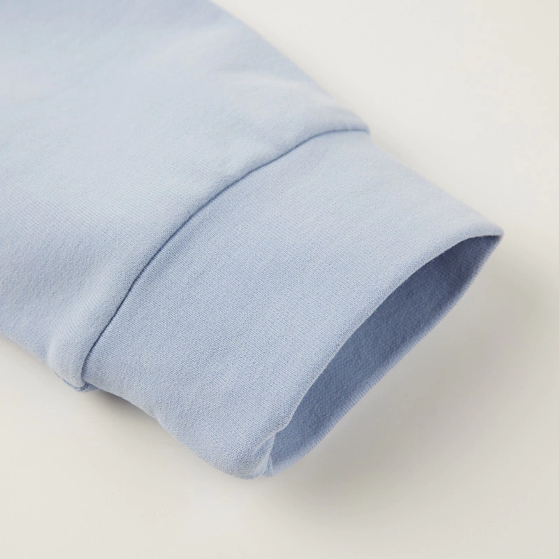 Ribbed cuff detail on long sleeve baby bodysuit