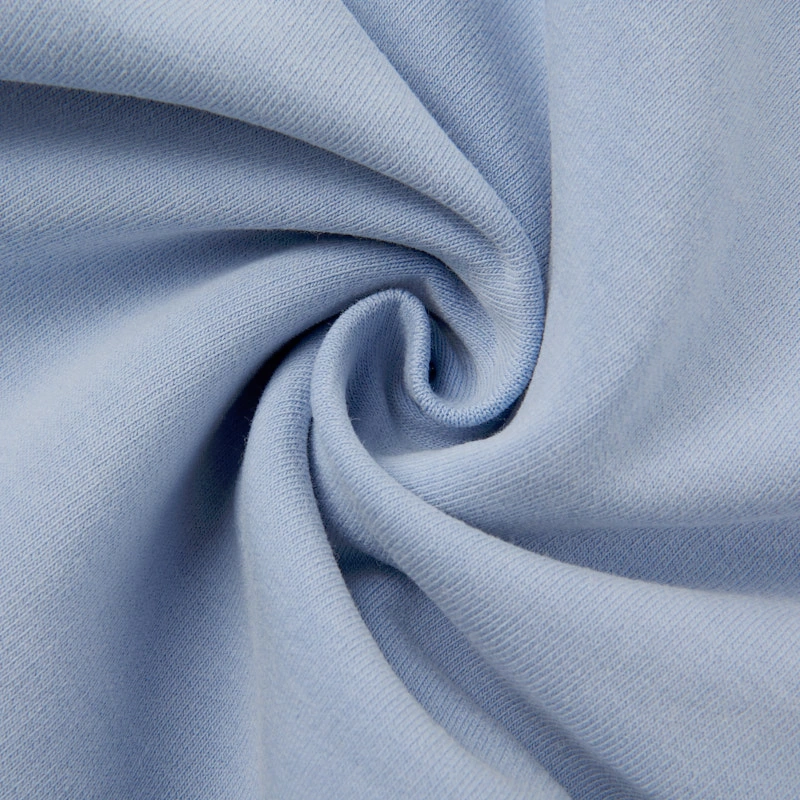 Close view of French Terry loop texture on organic cotton baby bodysuit