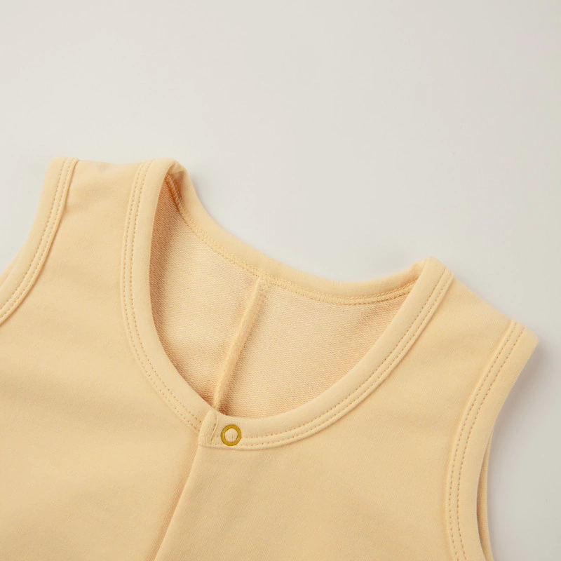 Senseng organic cotton sleeveless baby romper in plant-dyed yellow