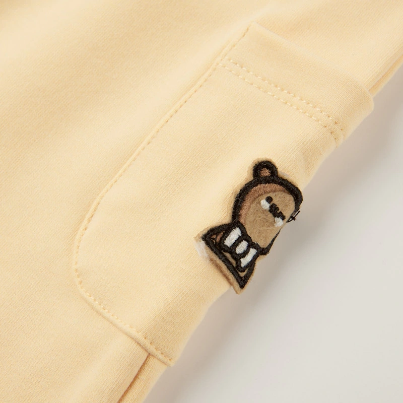 Senseng organic cotton sleeveless baby romper in plant-dyed yellow