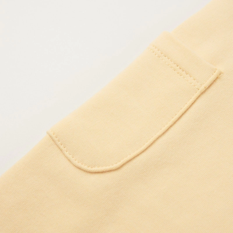 Senseng organic cotton sleeveless baby romper in plant-dyed yellow