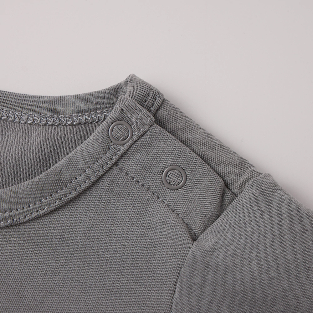 Snap bottom for easy diaper changes on long sleeve romper