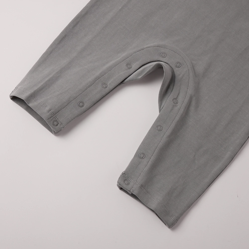 Boo romper layered with vest and jacket for cooler weather