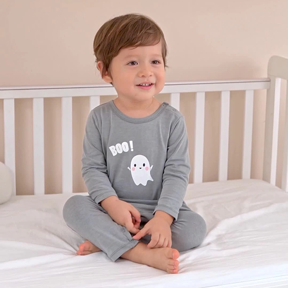 Front view of Baby Boo print organic cotton long sleeve romper