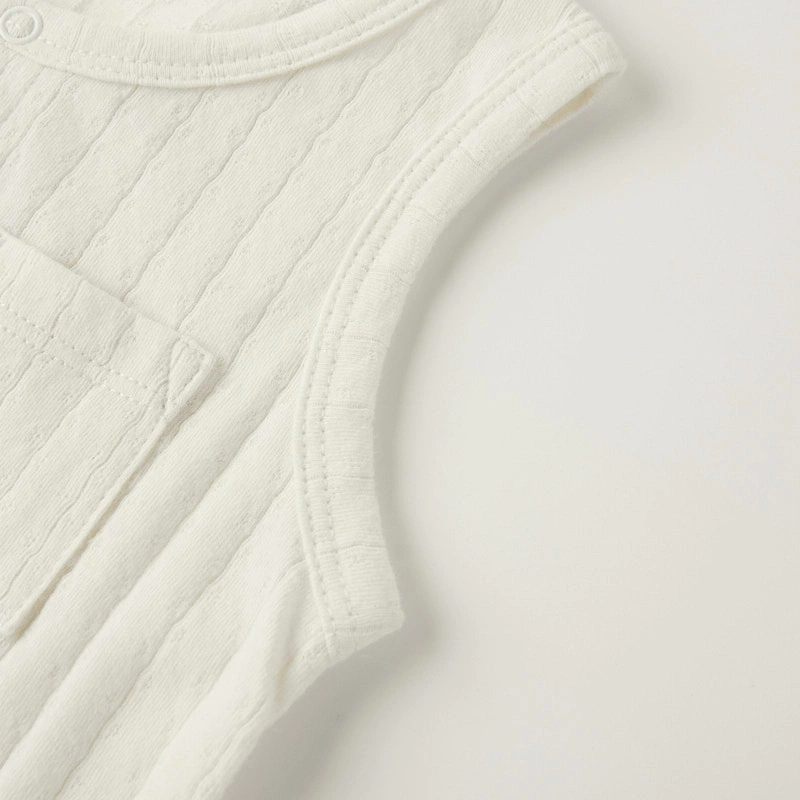 Front pocket detail on unisex baby pointelle romper