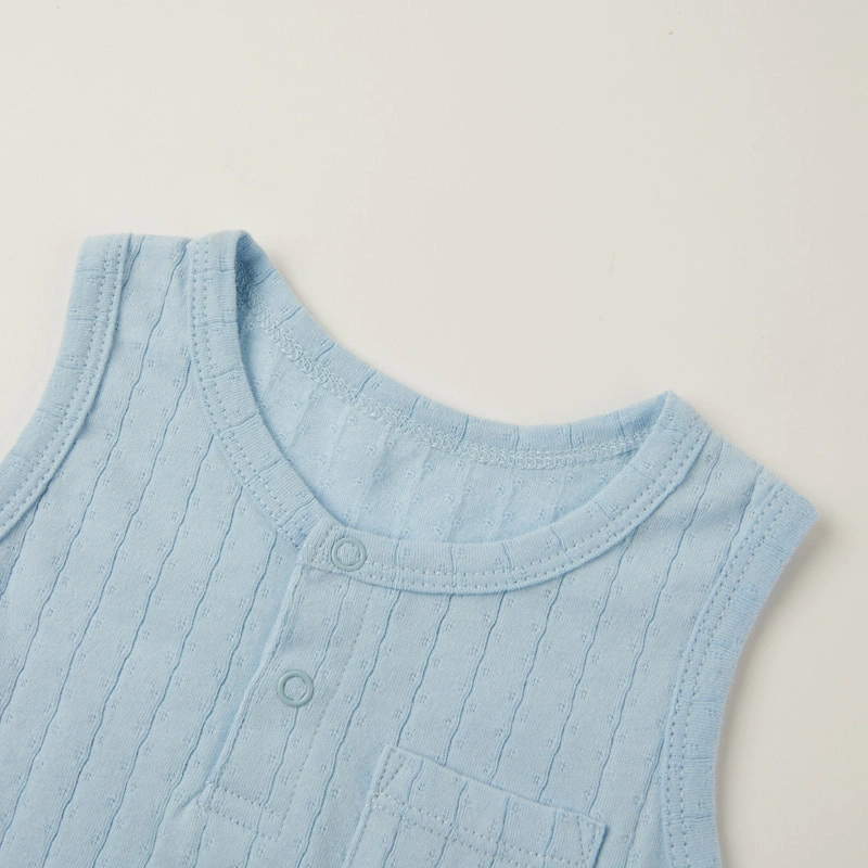 Baby wearing organic cotton plant-dyed unisex romper

