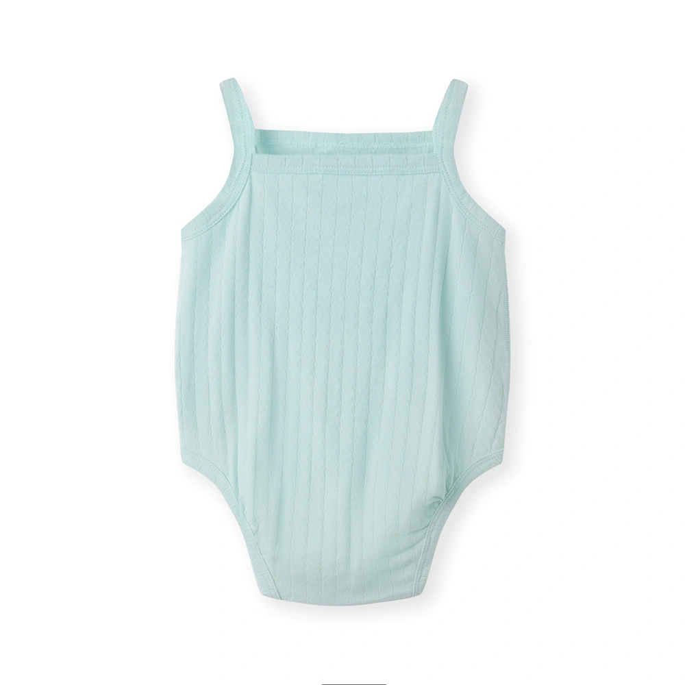 Baby girl wearing Senseng organic cotton pointelle strappy bodysuit, plant-dyed, breathable and eco-friendly