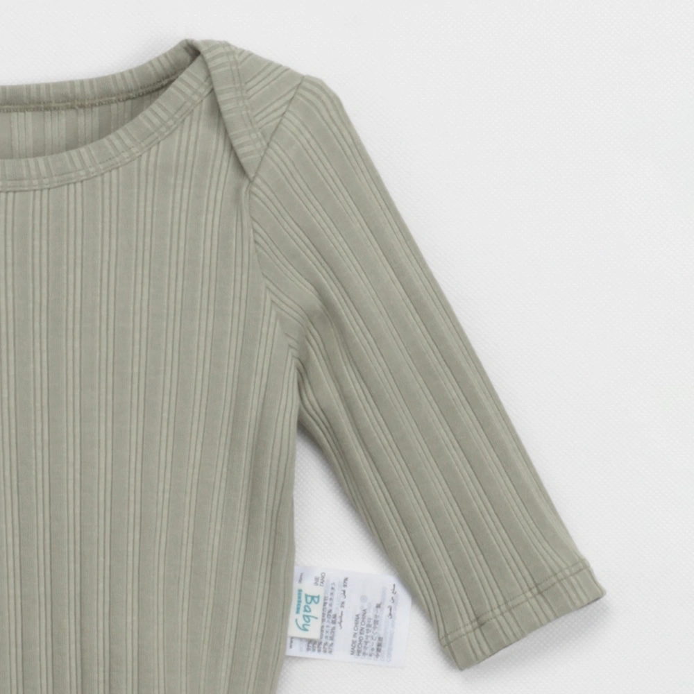  Lap shoulder detail on long-sleeve bodysuit