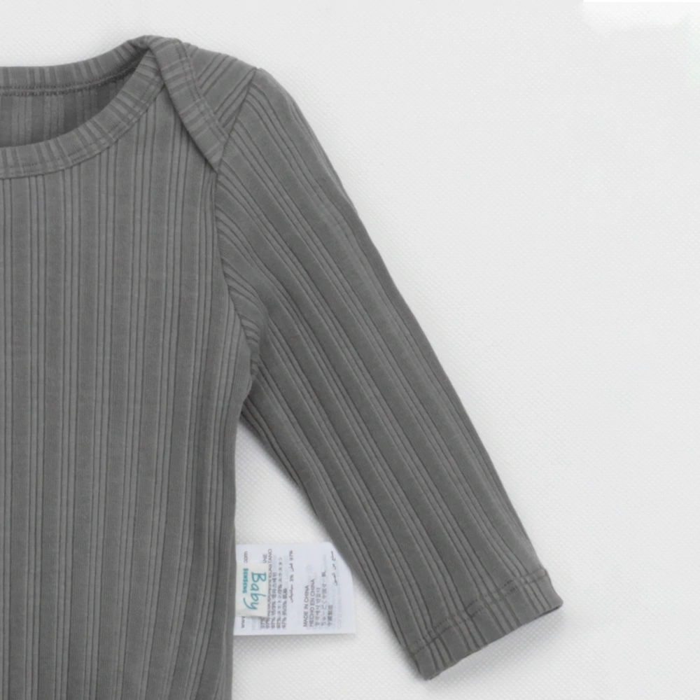  Lap shoulder detail on long-sleeve bodysuit