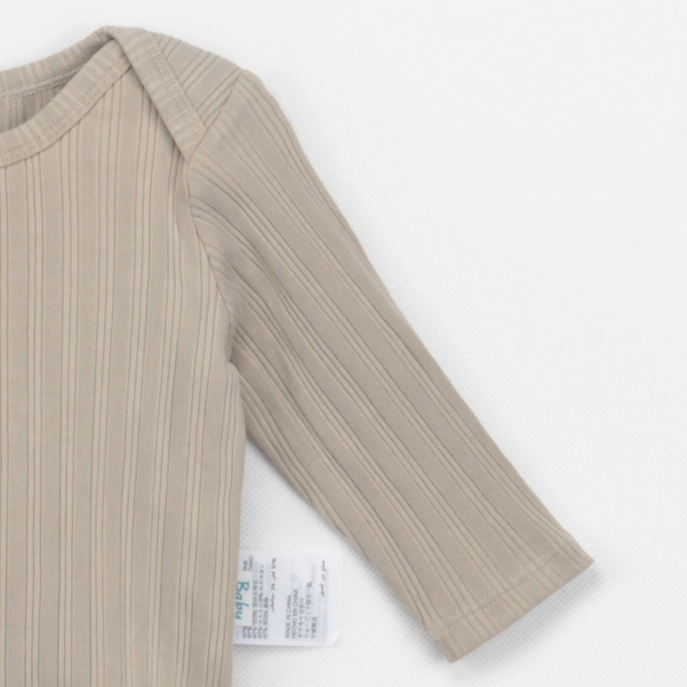  Lap shoulder detail on long-sleeve bodysuit