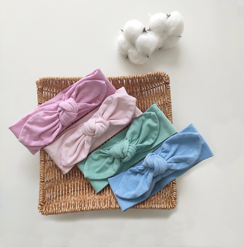 Plant-dyed organic cotton baby headband for newborn to 24 months.