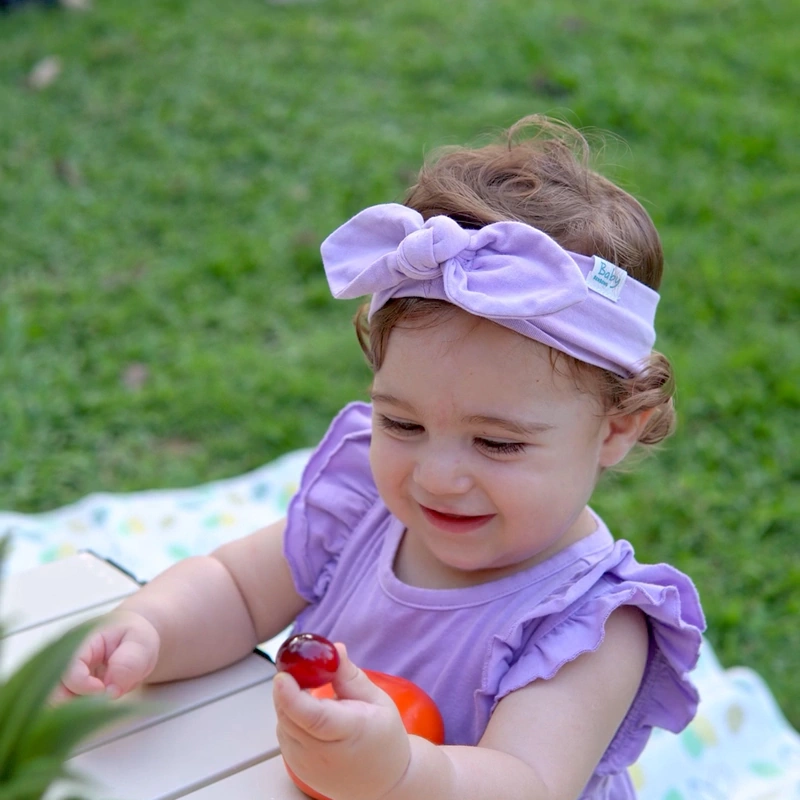 Plant-dyed organic cotton baby headband for newborn to 24 months.