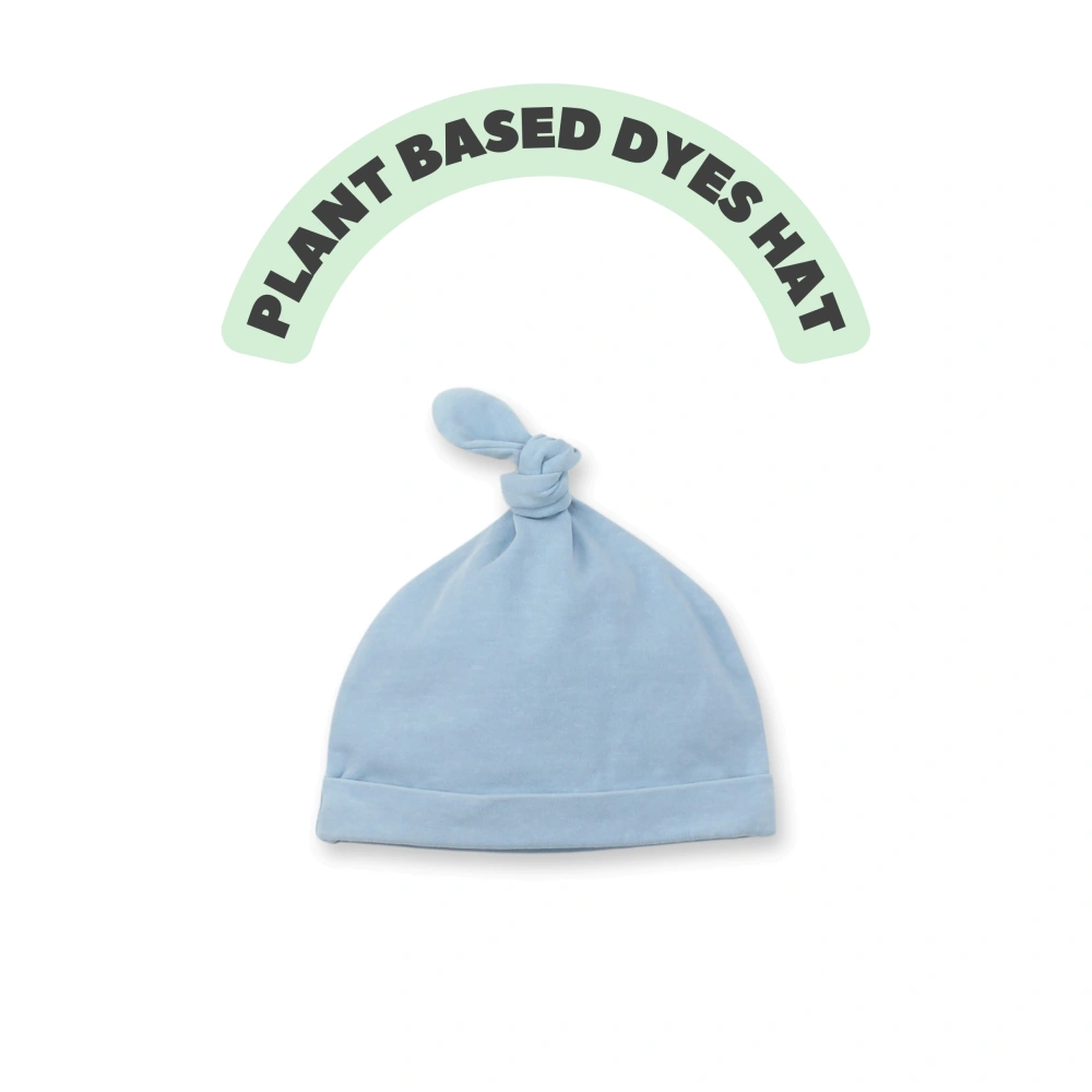 Organic-cotton baby boutique beanie in plant-dyed color with folded ear-cozy cuff 