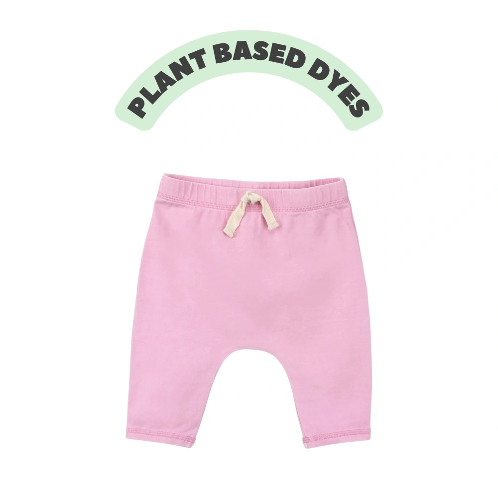 Senseng organic cotton baby jogger pants in plant-dyed salmon shade, eco-friendly toddler joggers (0–18M)