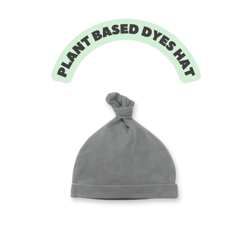 Organic-cotton baby boutique beanie in plant-dyed color with folded ear-cozy cuff 