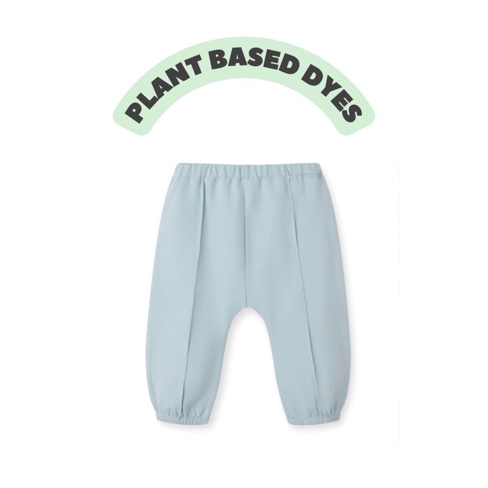 Baby wearing plant-dyed organic-cotton French terry jogger pants with tied waist (style k1230876)