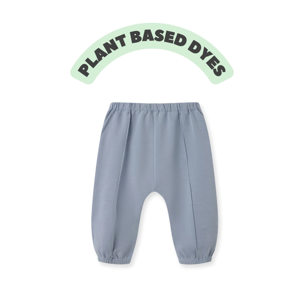 Baby wearing plant-dyed organic-cotton French terry jogger pants with tied waist (style k1230876)
