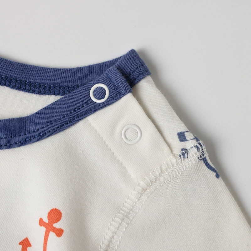 snap leg baby romper shoulder snaps navy trim