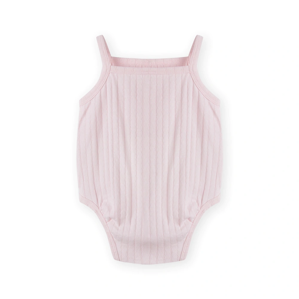 Baby girl wearing Senseng organic cotton pointelle strappy bodysuit, plant-dyed, breathable and eco-friendly