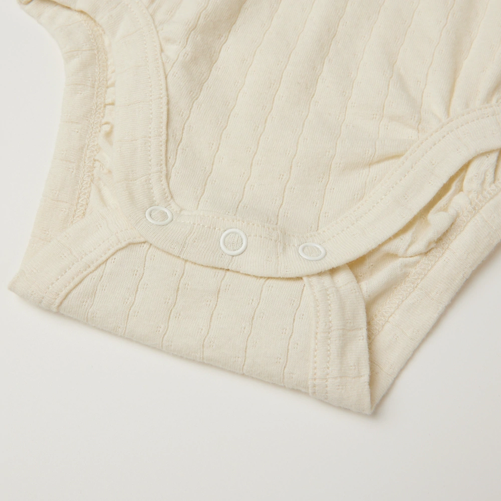 Pointelle sleeveless organic cotton baby bodysuit with plant-based dyes, eco-friendly design for infants 0-18 months