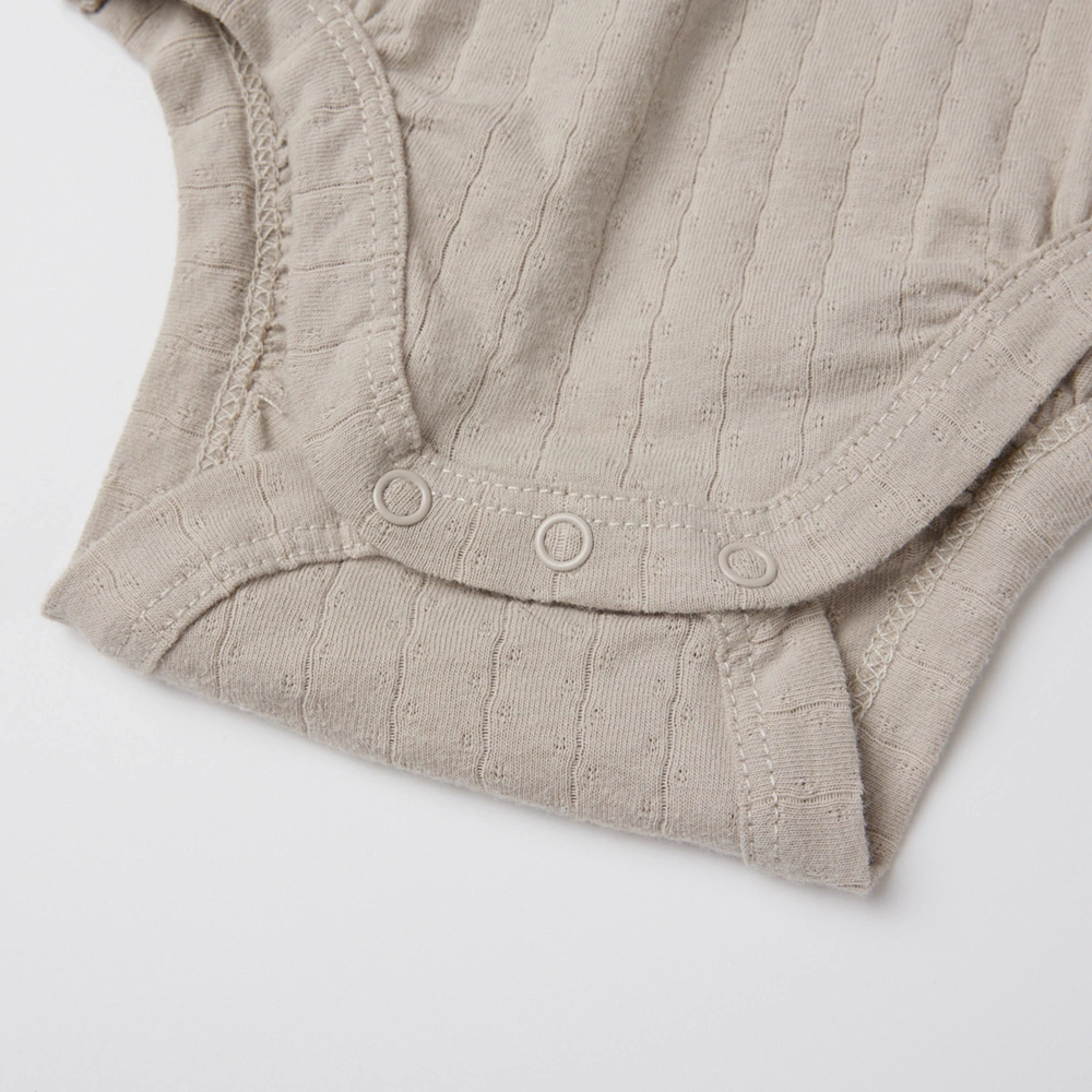 Nickel-free snaps on plant-dyed bodysuit