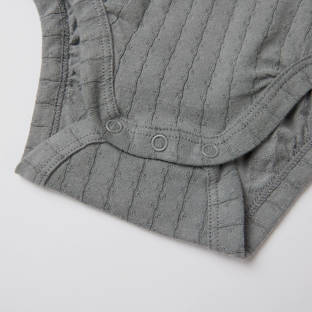 Pointelle sleeveless organic cotton baby bodysuit with plant-based dyes, eco-friendly design for infants 0-18 months