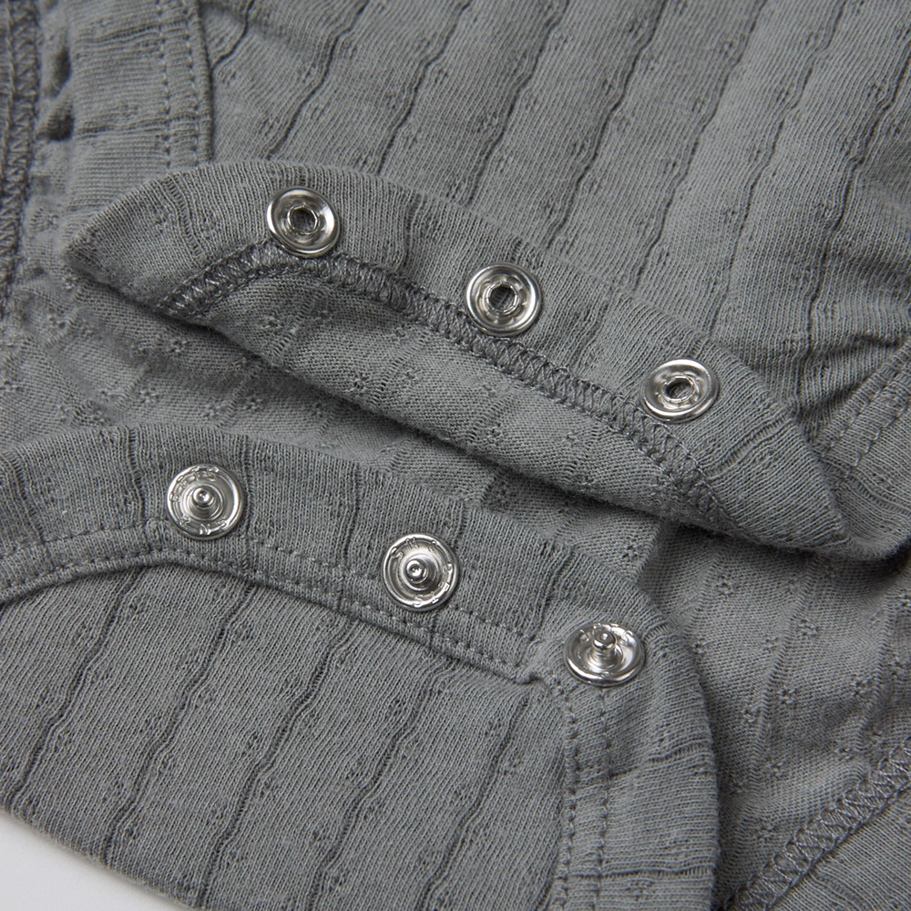 Pointelle sleeveless organic cotton baby bodysuit with plant-based dyes, eco-friendly design for infants 0-18 months