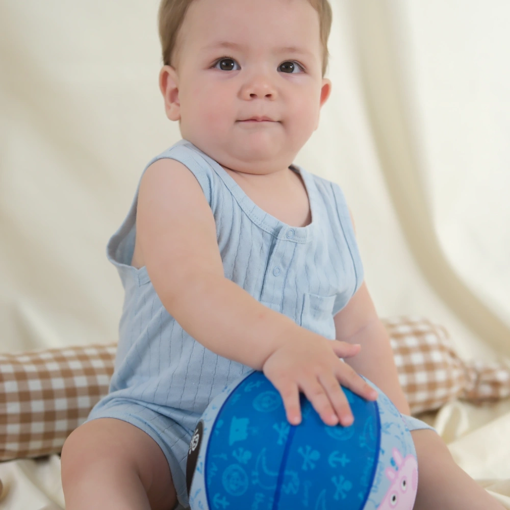 Cute baby in Senseng Plant-dyed Pointelle Unisex Pocket Romper