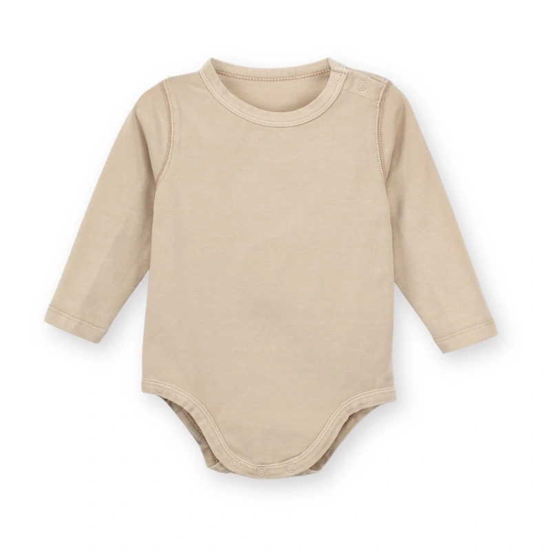 Front flat layout of the plant-dyed natural beige long sleeve baby bodysuit designed for easy daily layering