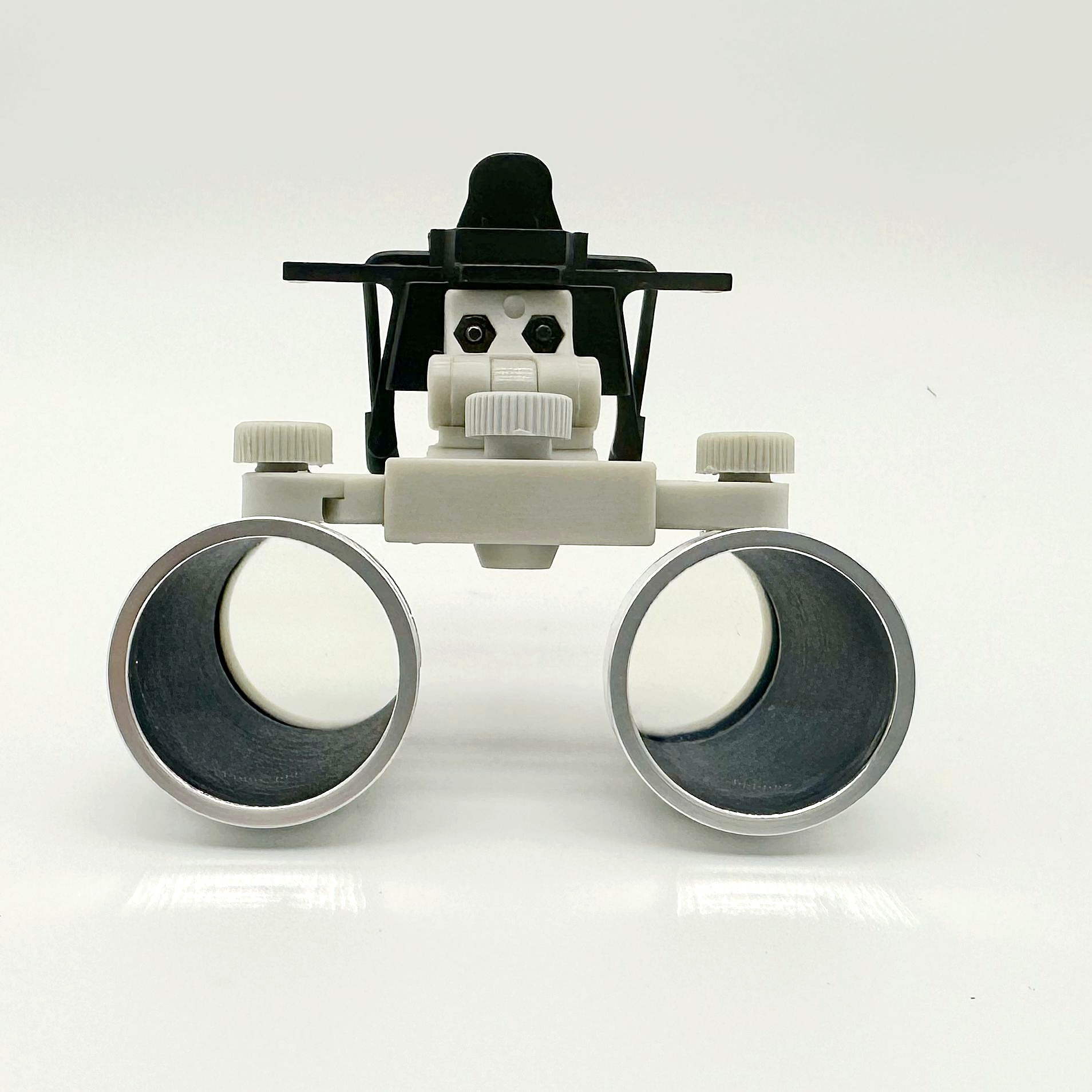 CareOptik clip-on loupes optical barrels close-up view