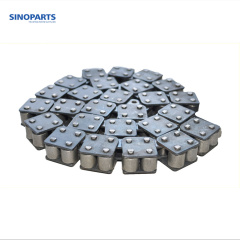 Double pitch conveyor chain with top rollers