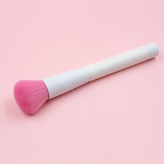 Blush brush with pink nylon hair and pure white handle