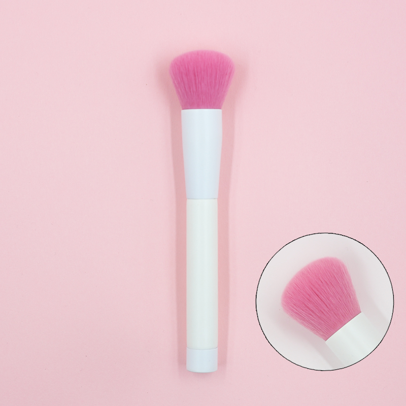 Blush brush with pink nylon hair and pure white handle