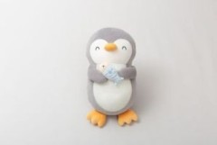 Penguin cushion with fish