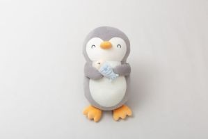 Penguin cushion with fish