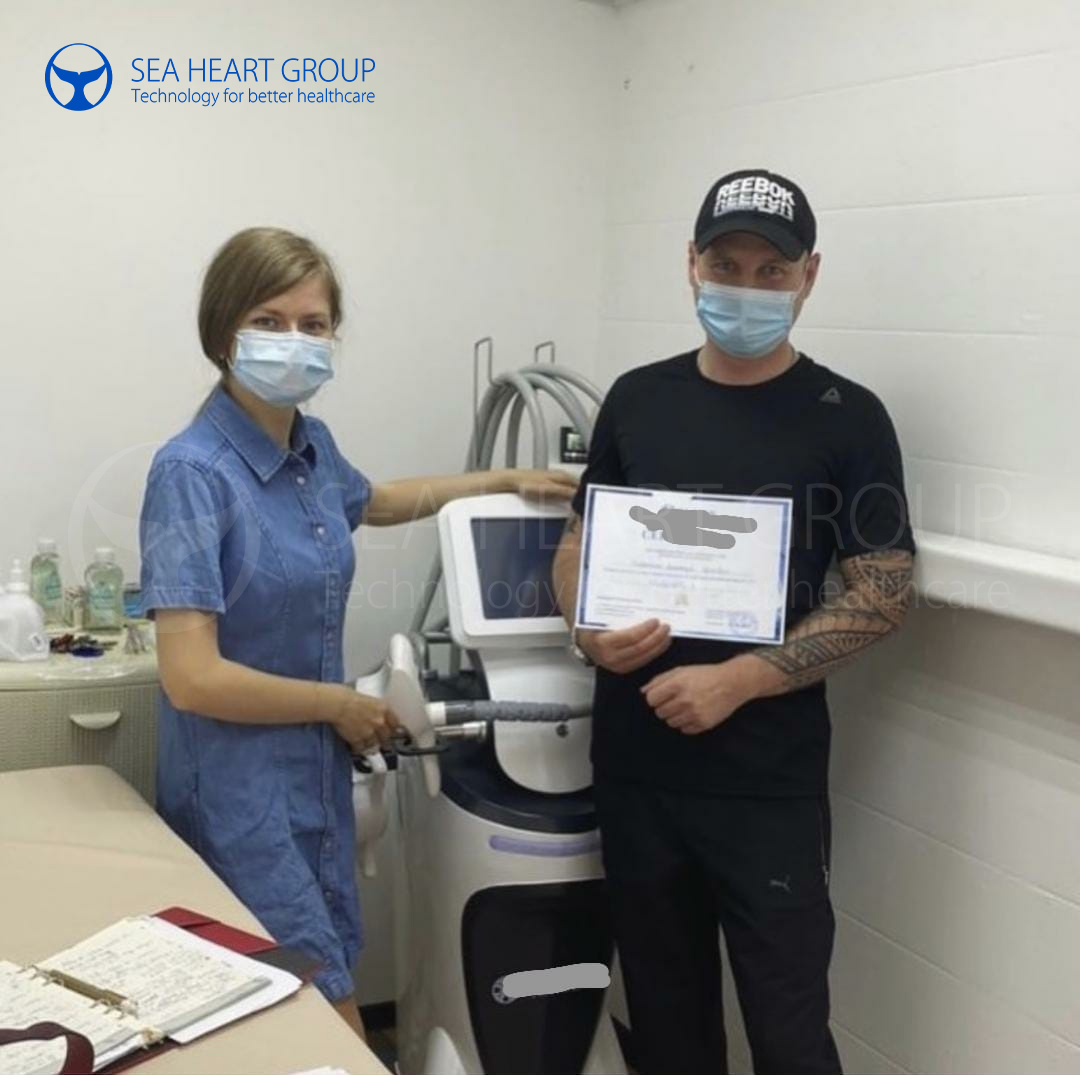 Beauty clinic owner with new SEA HEART device