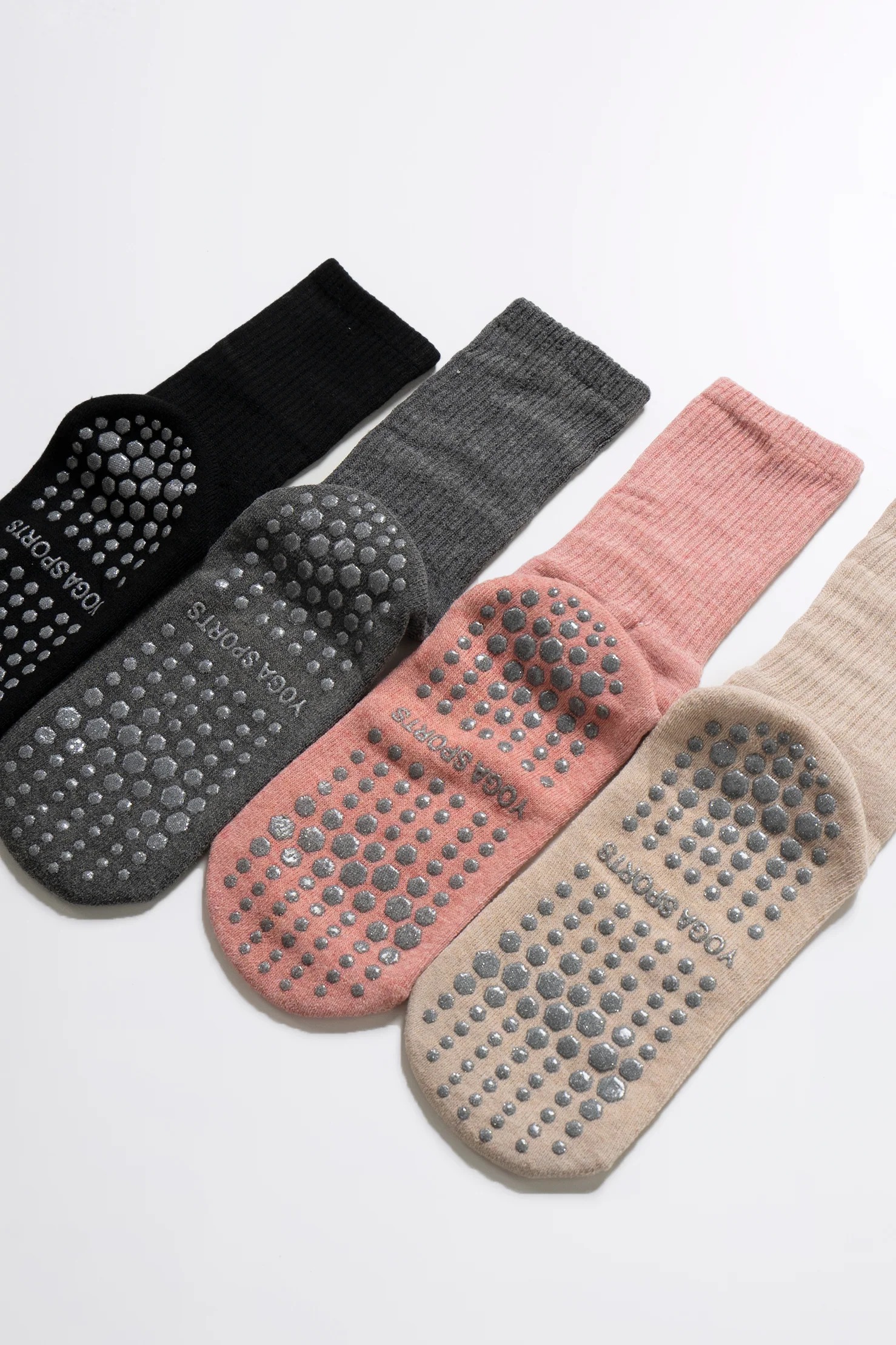 Grip socks with silicone dot traction patterns on the sole for indoor floor stability and slip resistance