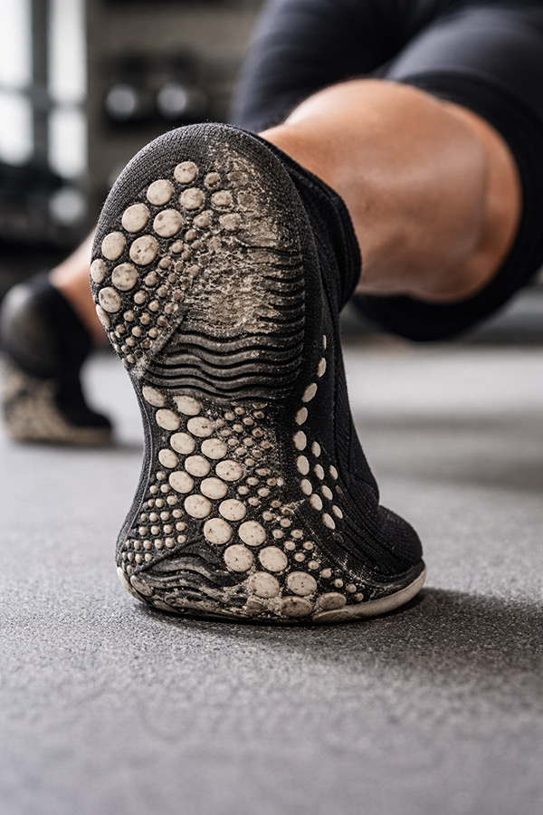 Factors influencing grip durability including material, bonding, and usage conditions