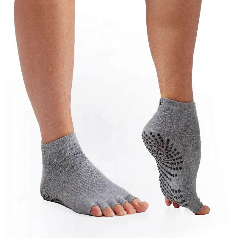 Grip Socks for Yoga on Wooden Floors: Stability Considerations